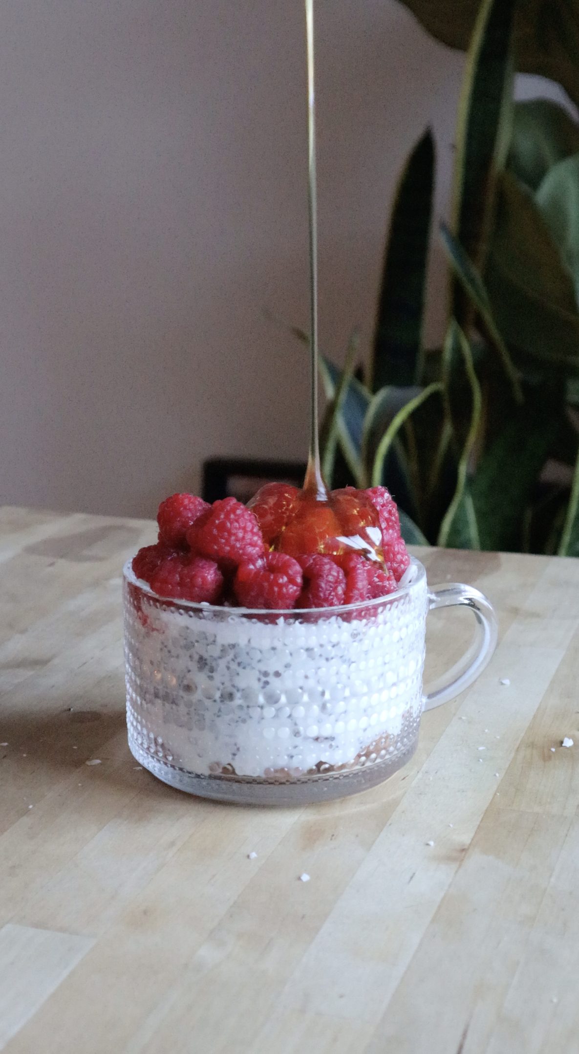 Chia seed parfait topped with raspberries
