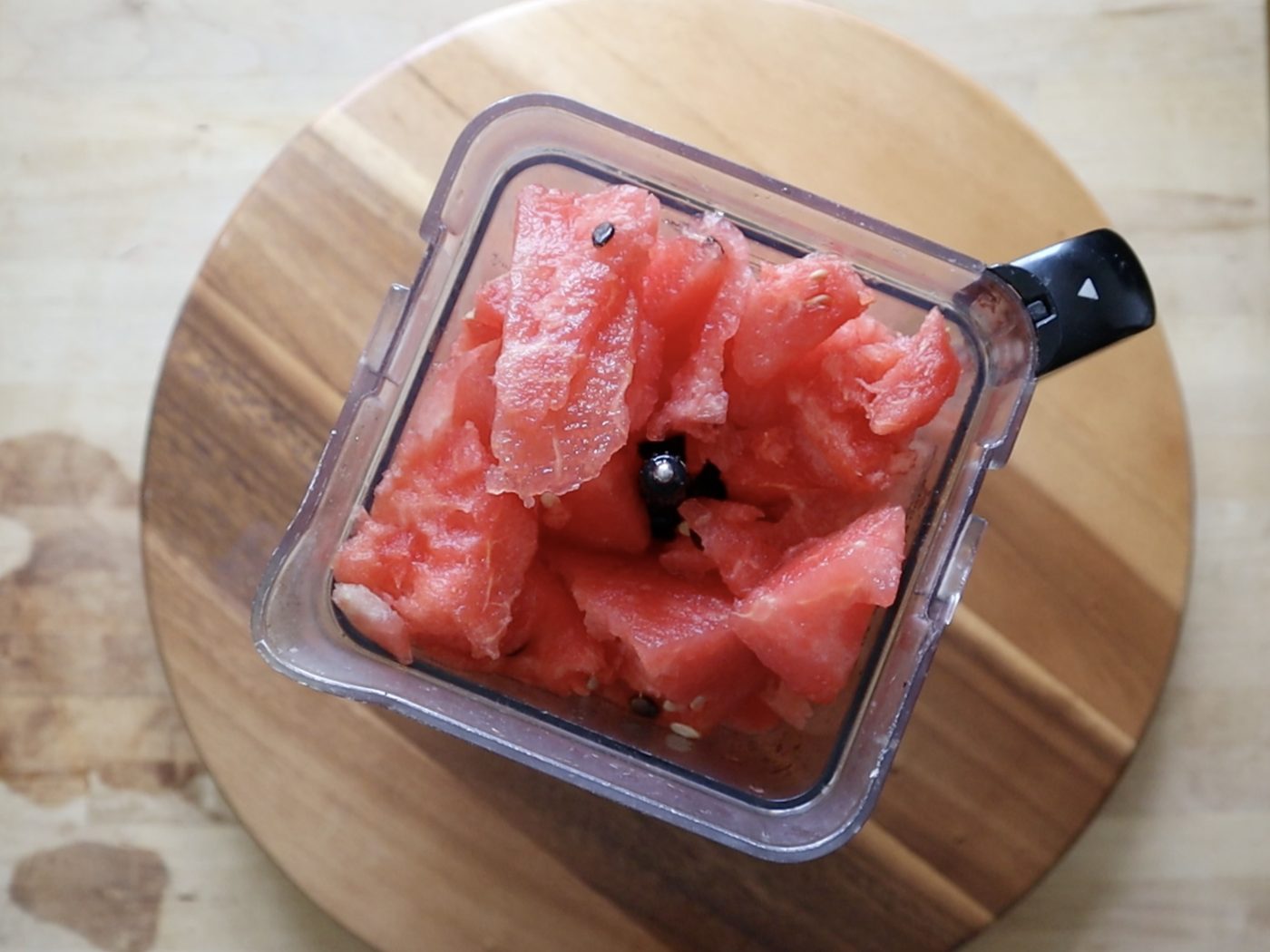 Watermelon chunks in a blender ready to blend